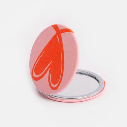 مرآة دائرية قابلة للطي مزدوجة الجوانب من كارولين جاردنر