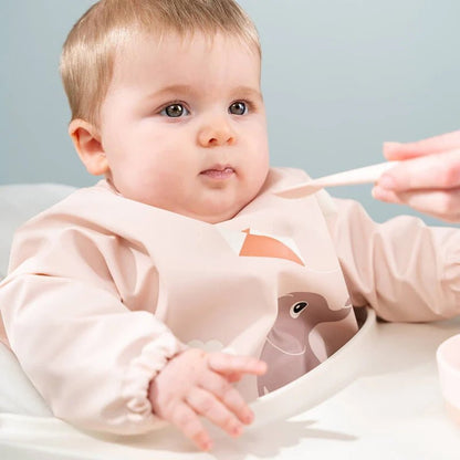 DONE BY DEER Playground Waterproof Long Sleeved Baby Bib with Elasticated Sleeves in Kuwait - Waha Lifestyle