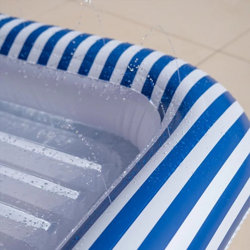 FLAMINGUEO Sacha Large Inflatable Tanning Pool Mat with Sprinkler &amp; Removable Pillow in Kuwait - Waha Lifestyle